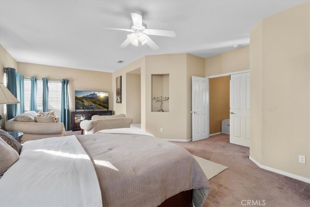 5531 San Carlos Court Rancho Cucamonga, CA 91739 - Photo 35 of 54 a living room with furniture and a chandelier