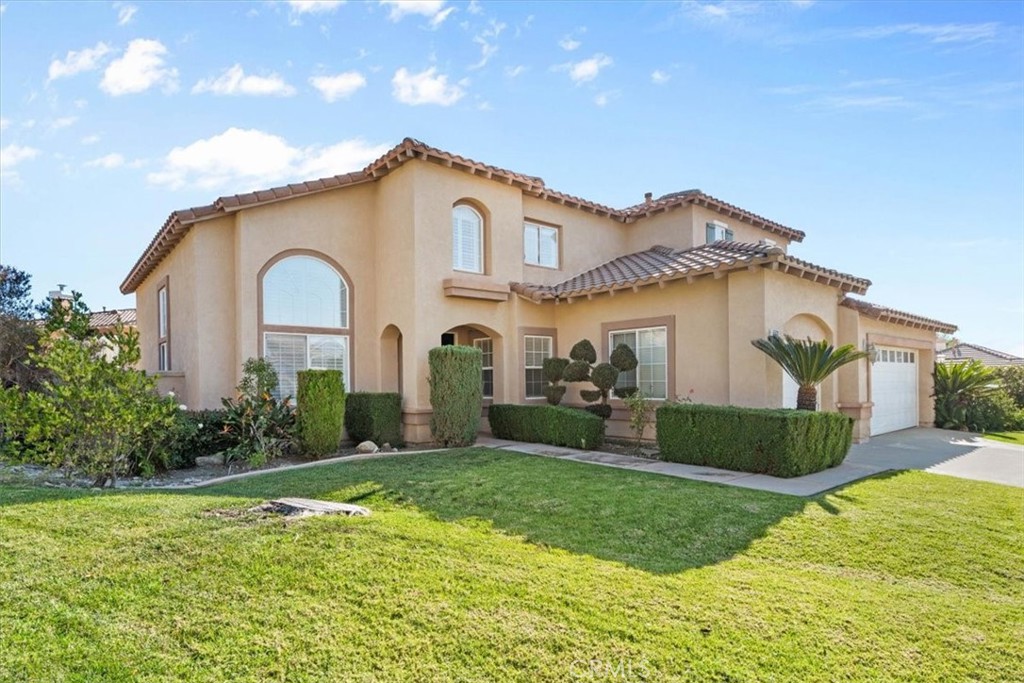 5531 San Carlos Court Rancho Cucamonga, CA 91739 - Photo 40 of 54 a view of a front of house with a yard