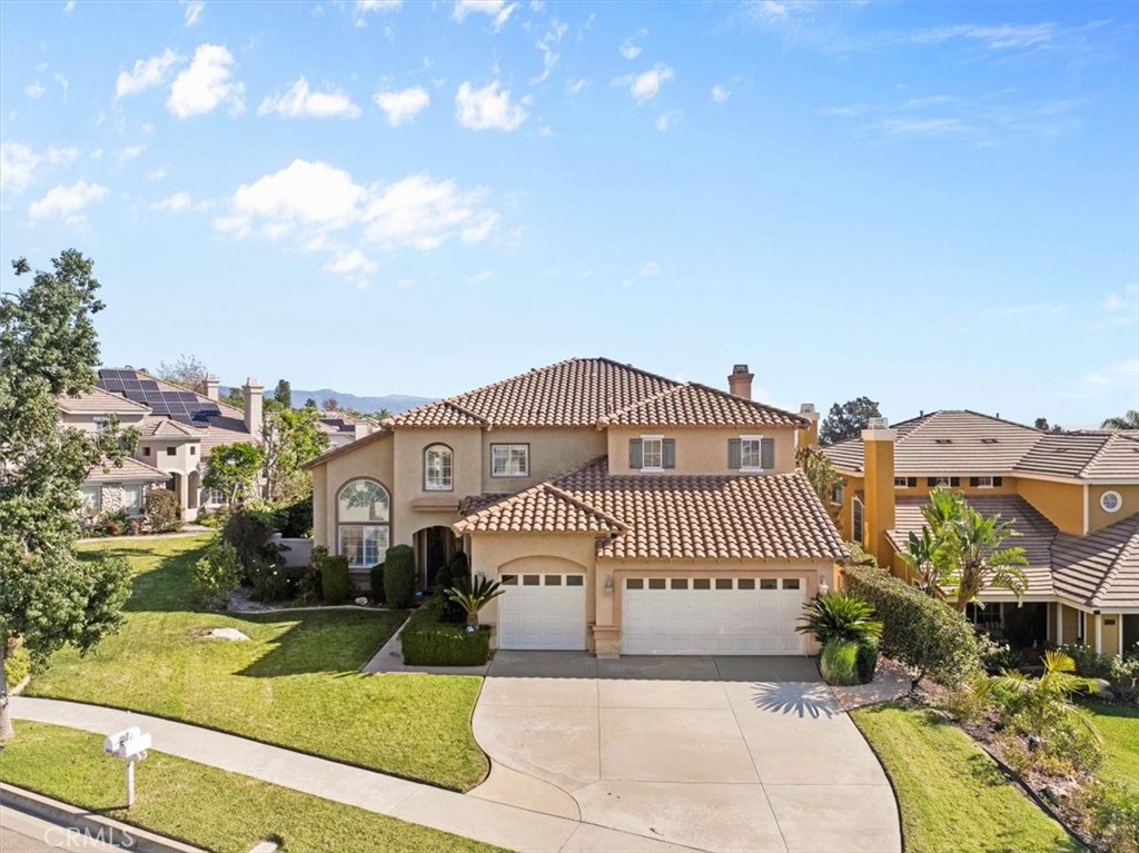 5531 San Carlos Court Rancho Cucamonga, CA 91739 - Photo 42 of 54 a view of a house with a yard