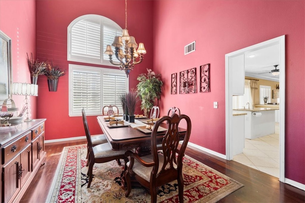 5531 San Carlos Court Rancho Cucamonga, CA 91739 - Photo 6 of 54 a view of a dining room with furniture and wooden floor