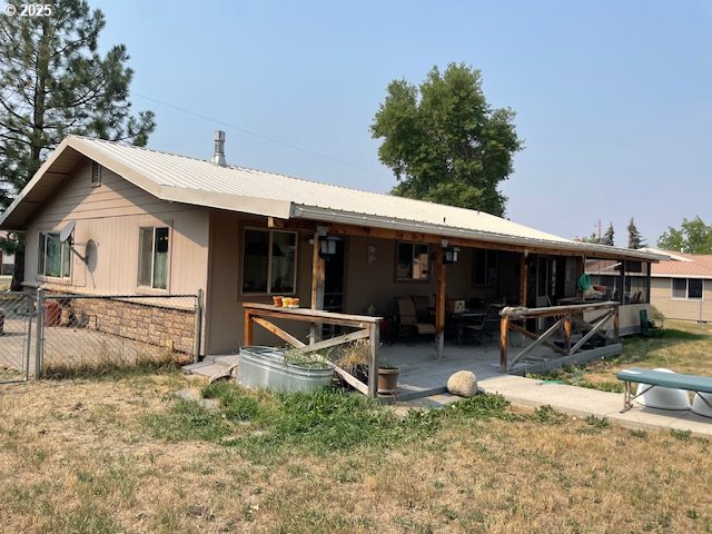 704 North Russell Street Joseph, OR 97846 - Photo 2 of 8 a view of a house with backyard