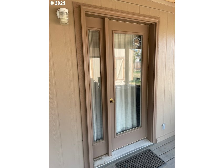 704 North Russell Street Joseph, OR 97846 - Photo 5 of 8 a view of a bathroom with a door