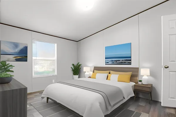 a bedroom with bed and window