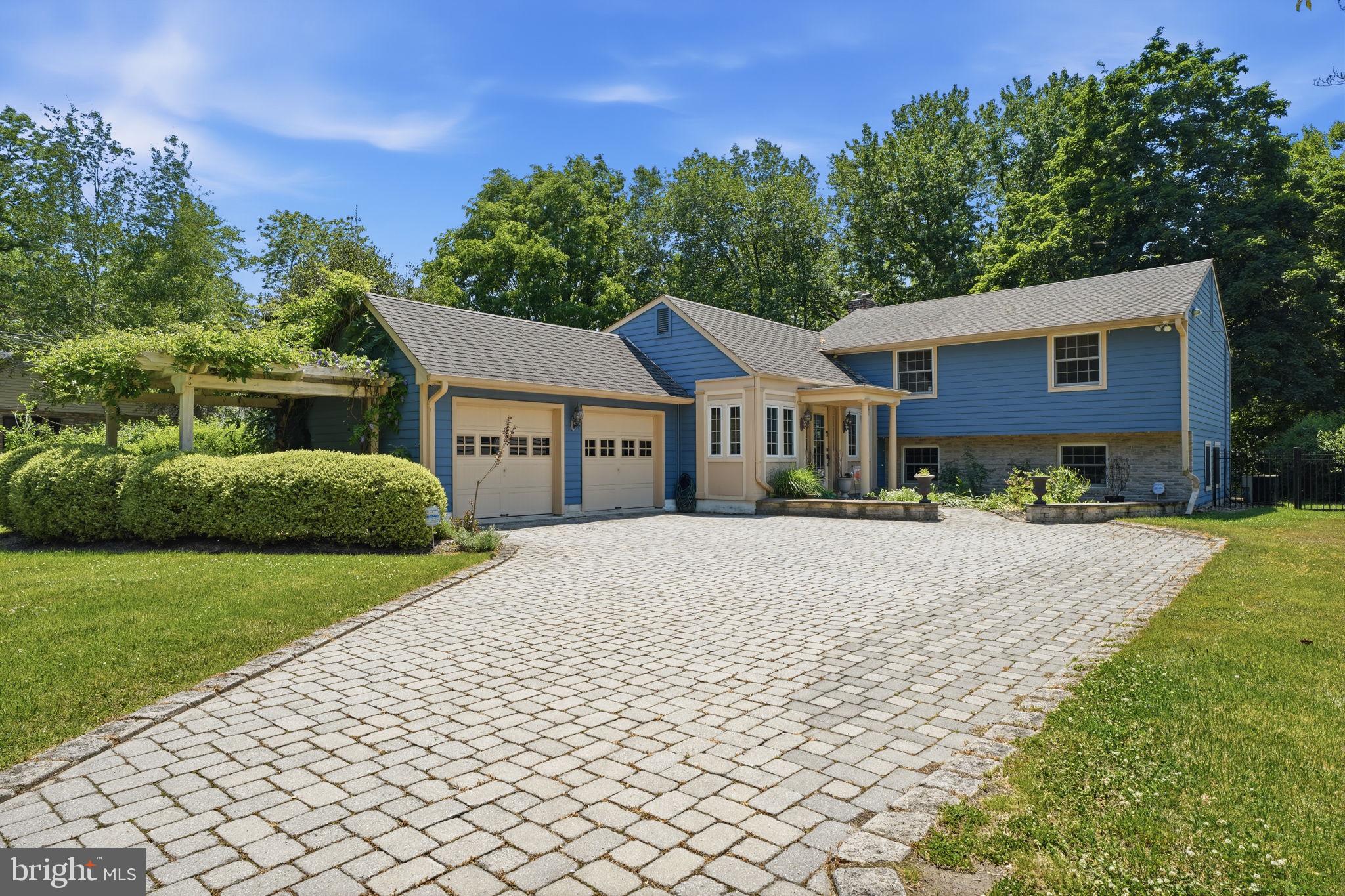 621 River Road Yardley, PA 19067 - Photo 64 of 75 a front view of a house with a yard and trees
