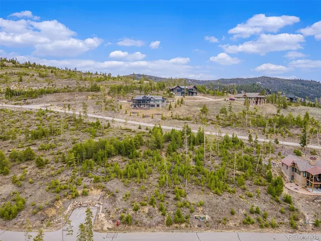 a view of an ocean and a mountain