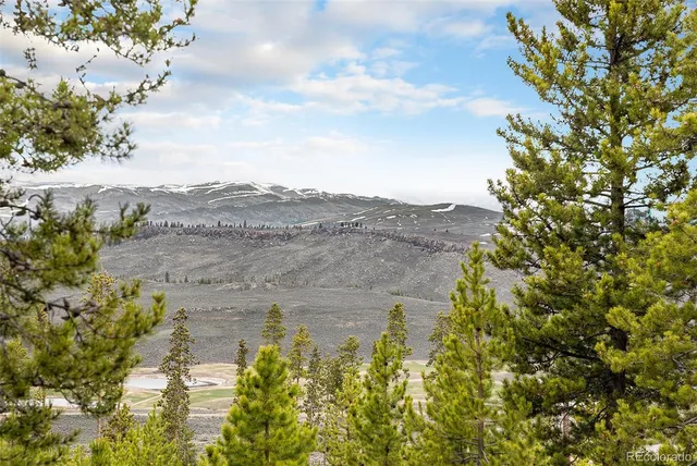 a view of a lake with a mountain in the background