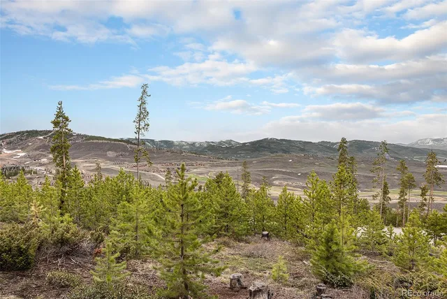 a view of a lake with a big yard