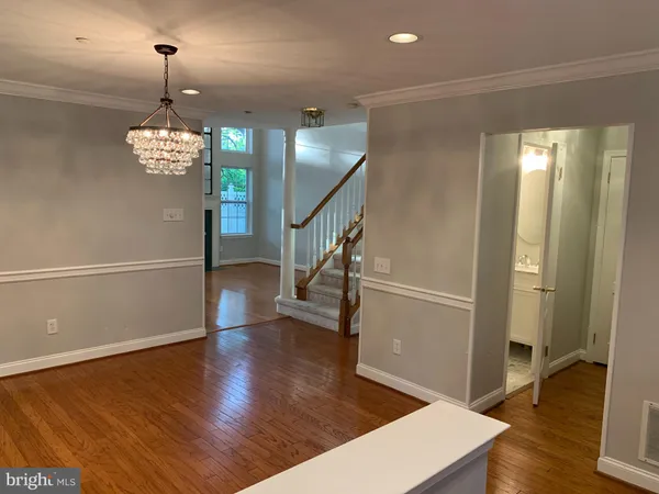 a view of entryway with wooden floor
