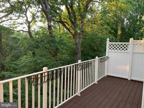 a view of a wooden fence and floor