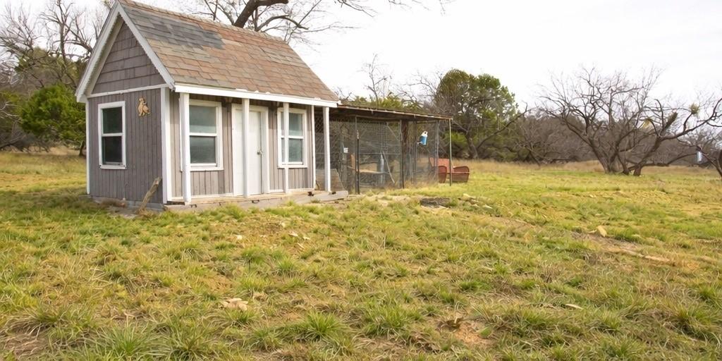 1982 Rocky Mound Road Graham, TX 76450 - Photo 29 of 33 front view of a house with a yard