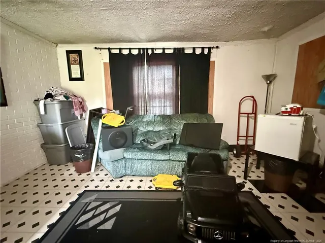 a kitchen with a table chairs and a stove