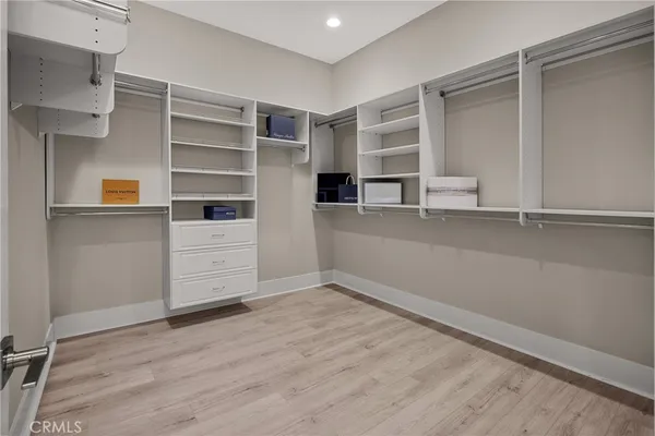 a view of an empty walk in closet