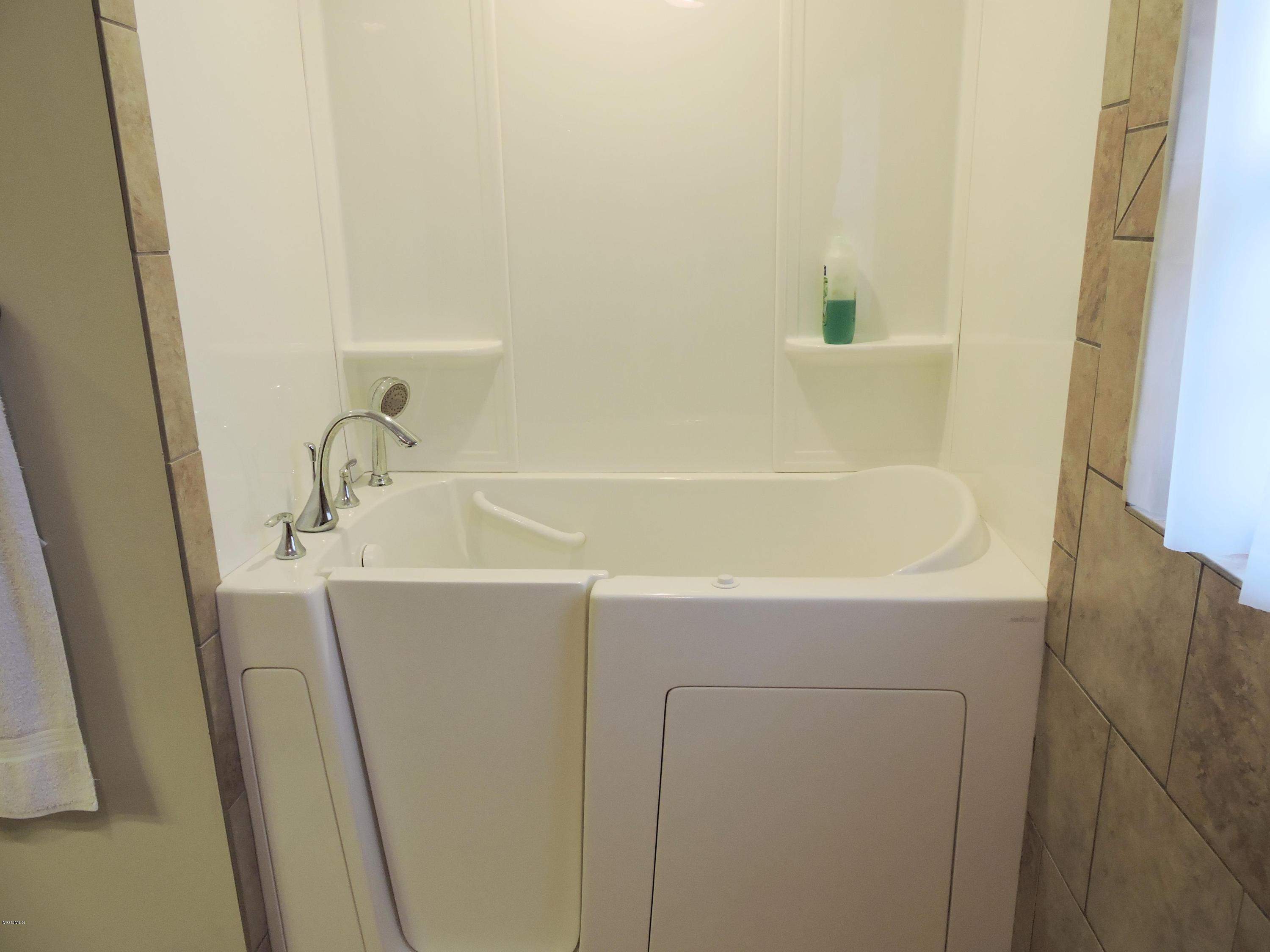189 Devaughn Road Lucedale, MS 39452 - Photo 23 of 46 Handicap Tub in Master Bathroom