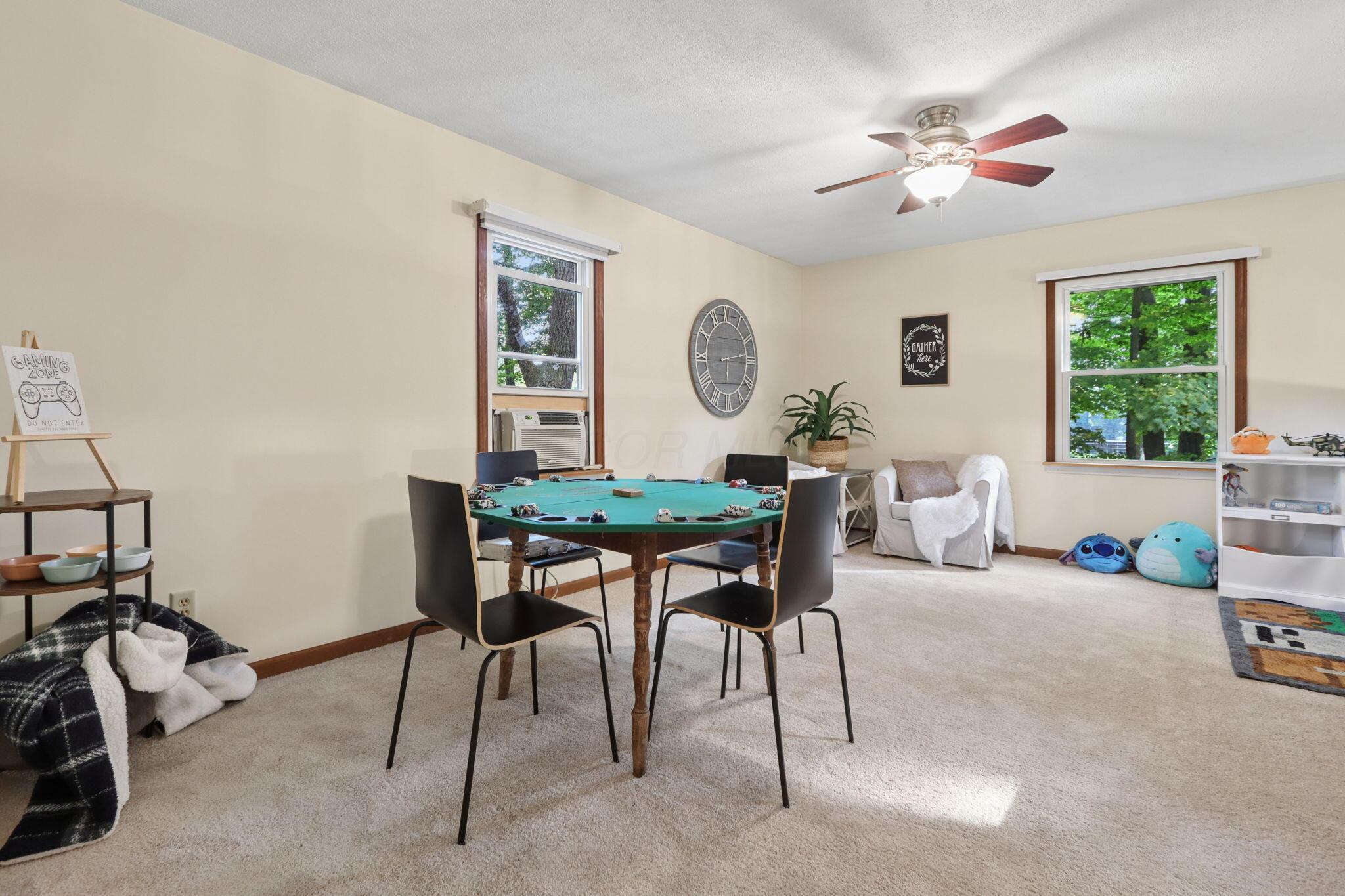 7115 Watkins Road Southwest Pataskala, OH 43062 - Photo 31 of 43 Upstairs family or game room with lighted ceiling fan