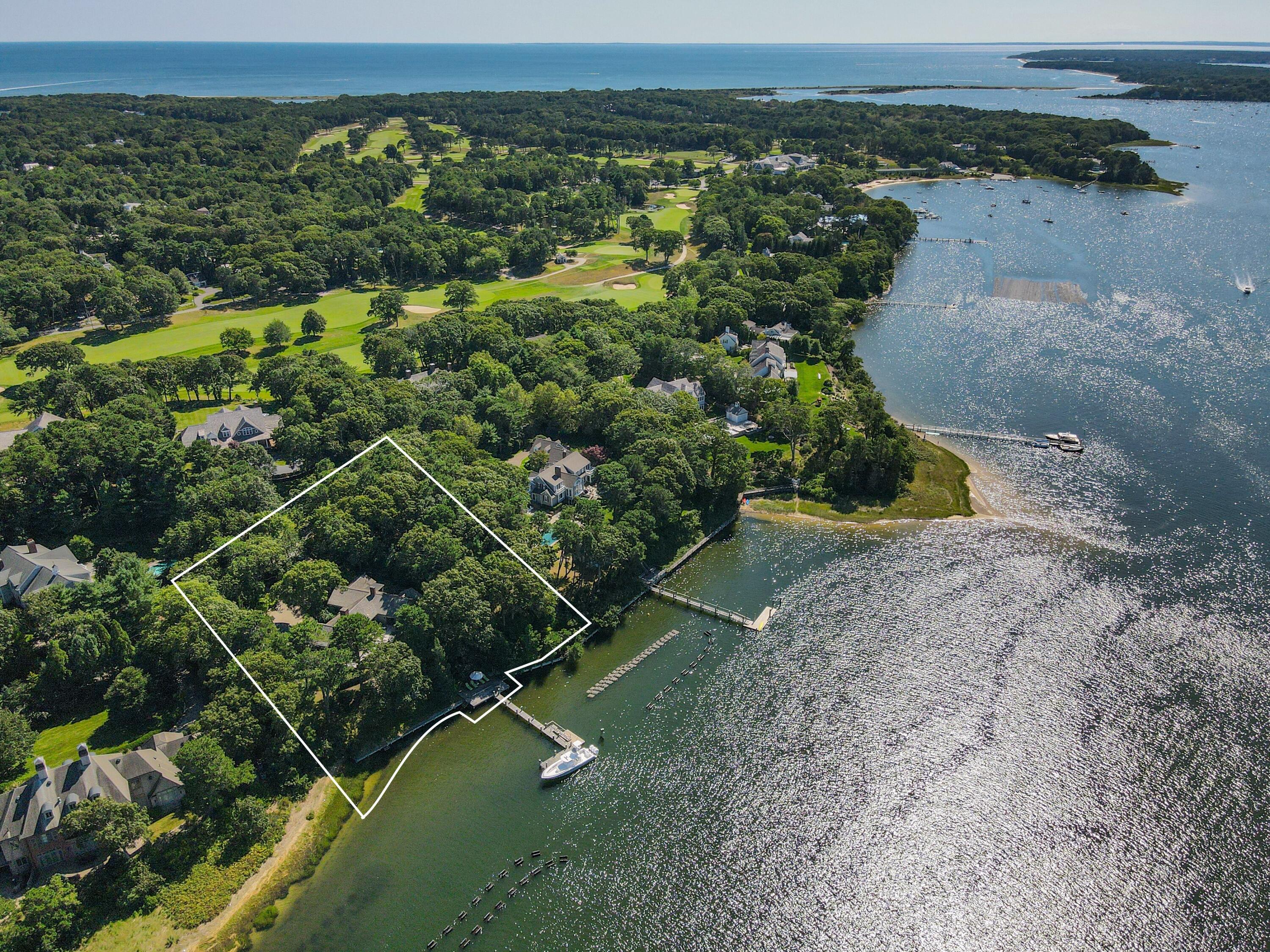 200 North Bay Road Osterville, MA 02655 - Photo 6 of 20 a view of a city with lush green forest