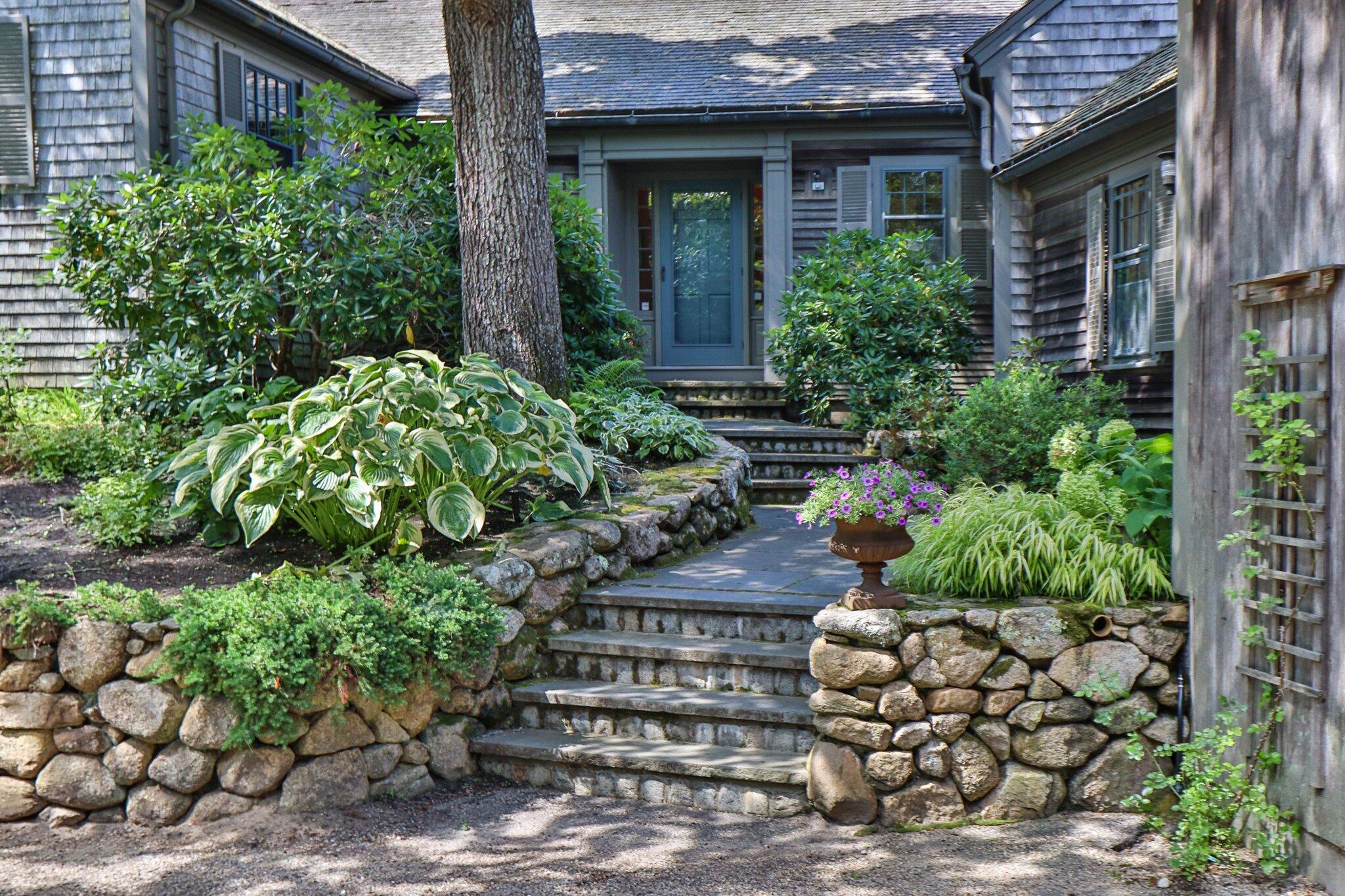200 North Bay Road Osterville, MA 02655 - Photo 8 of 20 a view of a house with a garden