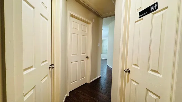 a view of a bathroom from the hallway