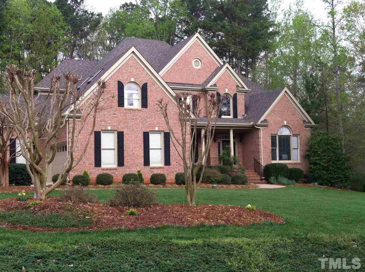 1405 Silverling Way Raleigh, NC 27613 - Photo 1 of 25 a front view of a house with a yard
