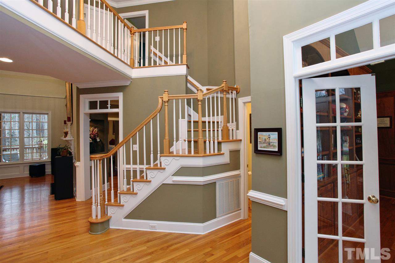 1405 Silverling Way Raleigh, NC 27613 - Photo 2 of 25 a view of entryway and hall with wooden floor