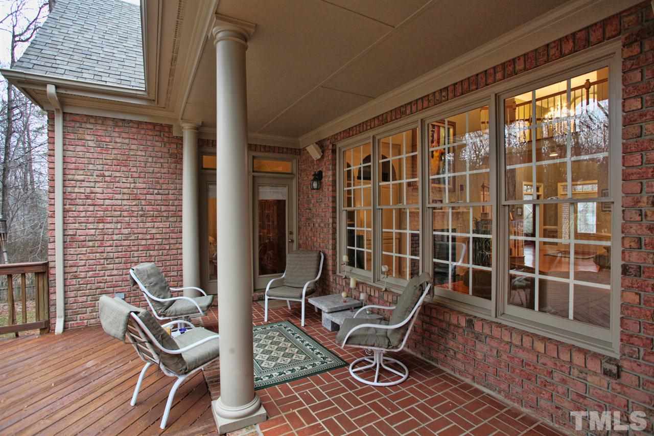 1405 Silverling Way Raleigh, NC 27613 - Photo 23 of 25 a balcony with table and chairs