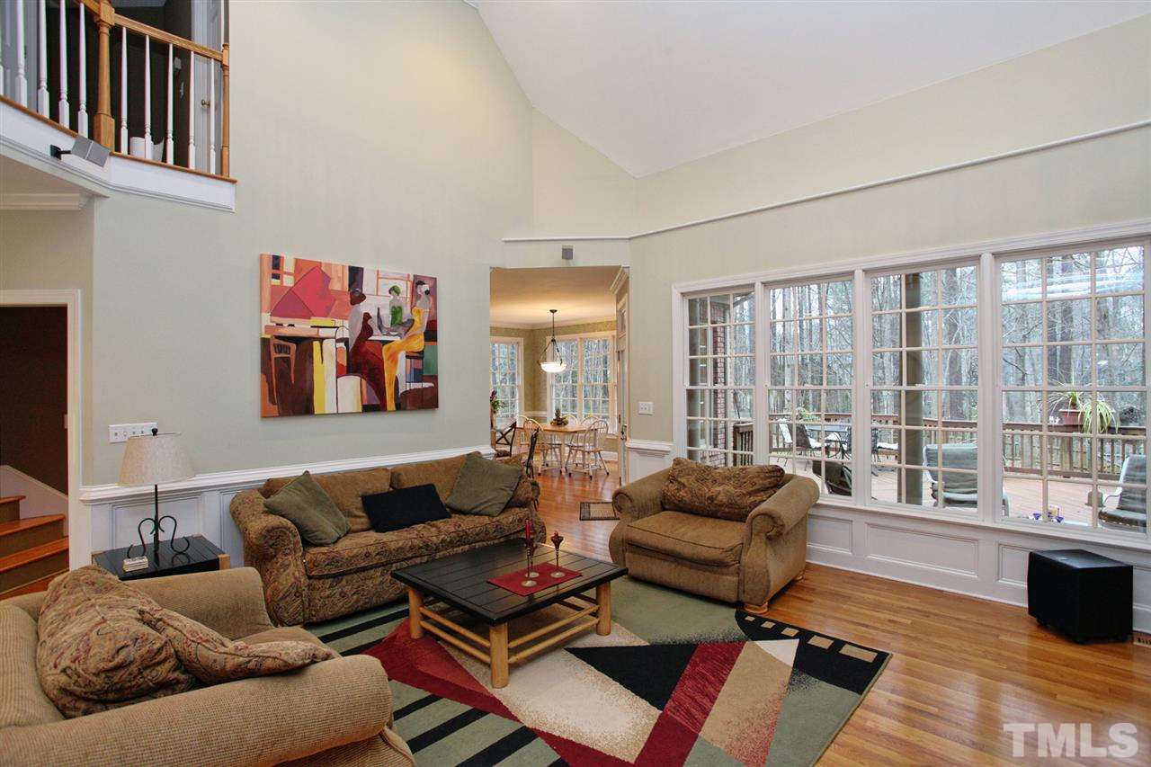1405 Silverling Way Raleigh, NC 27613 - Photo 6 of 25 a living room with furniture and a large window