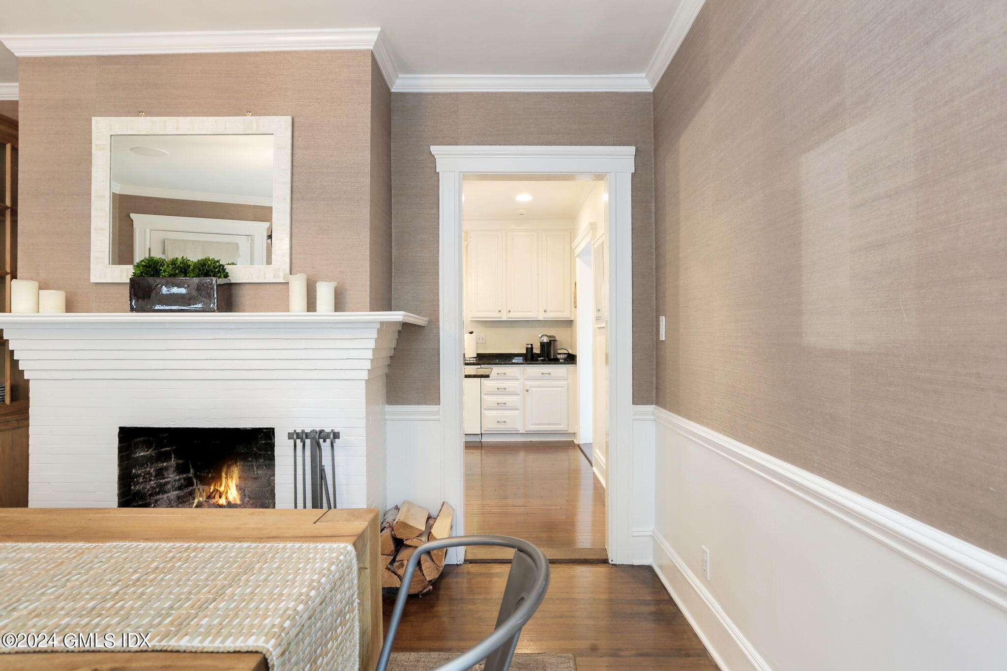 53 Ridge Street Greenwich, CT 06830 - Photo 11 of 26 a living room with furniture and a fireplace