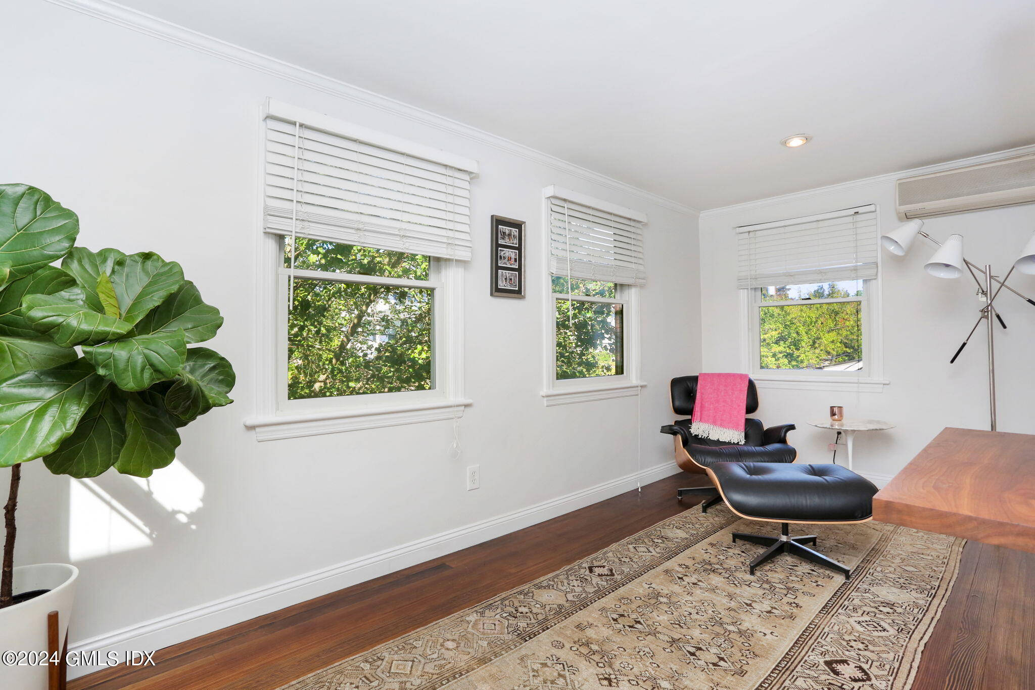 53 Ridge Street Greenwich, CT 06830 - Photo 21 of 26 a living room with furniture and a window