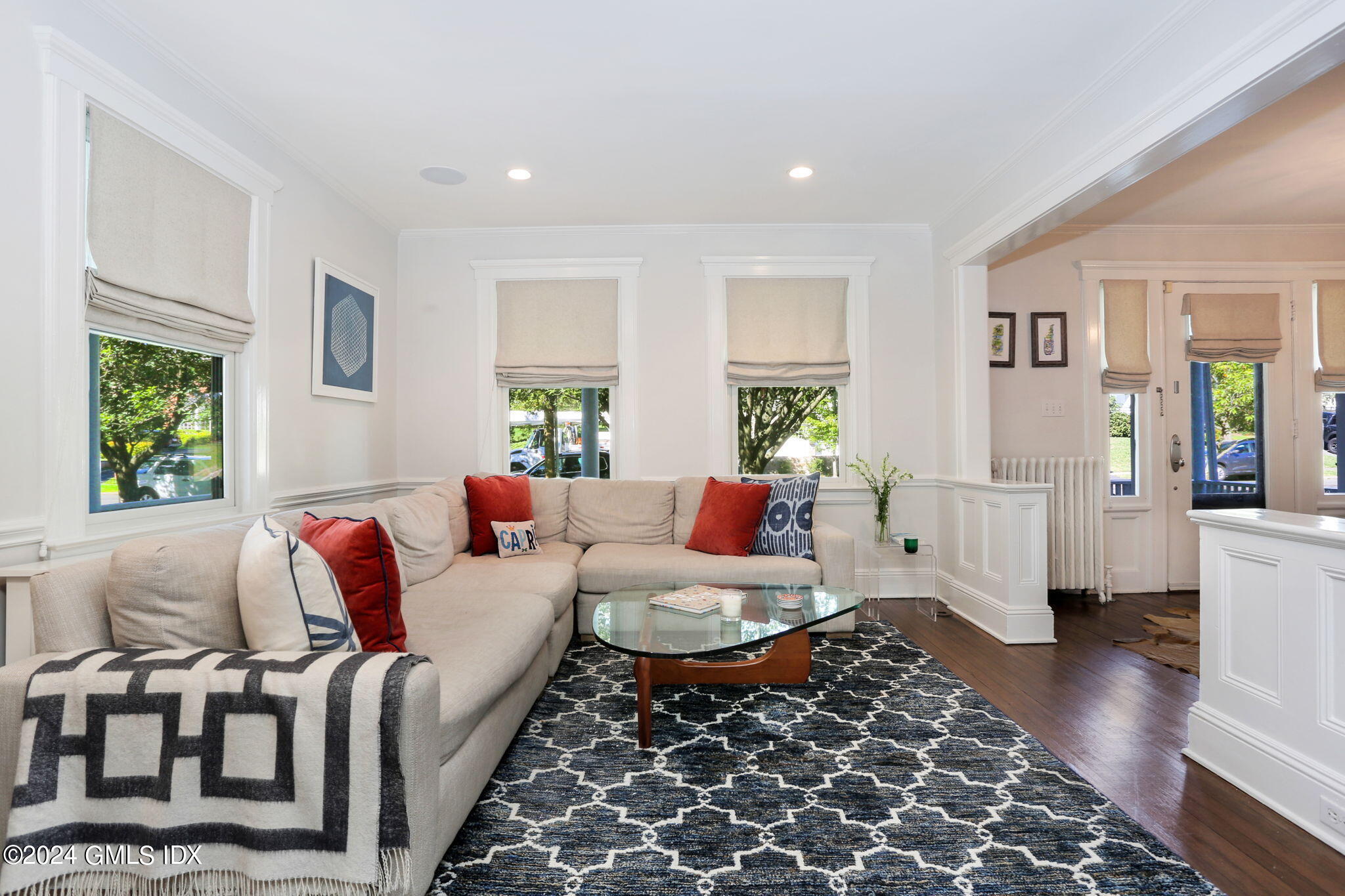 53 Ridge Street Greenwich, CT 06830 - Photo 7 of 26 a living room with furniture and wooden floor