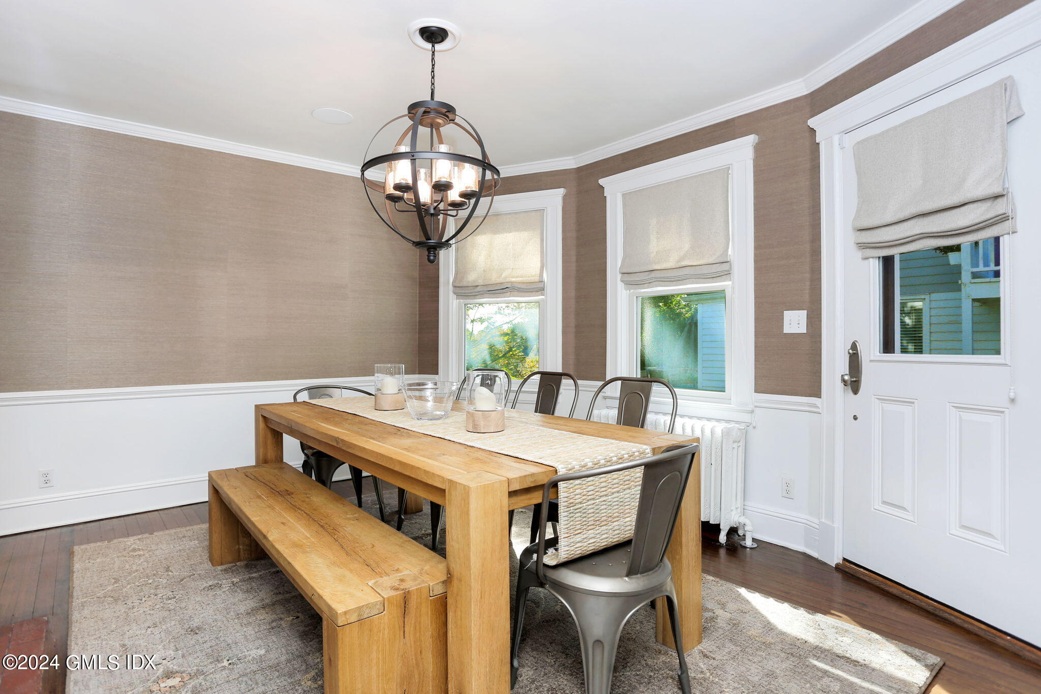 53 Ridge Street Greenwich, CT 06830 - Photo 8 of 26 a view of a dining room with furniture window and wooden floor