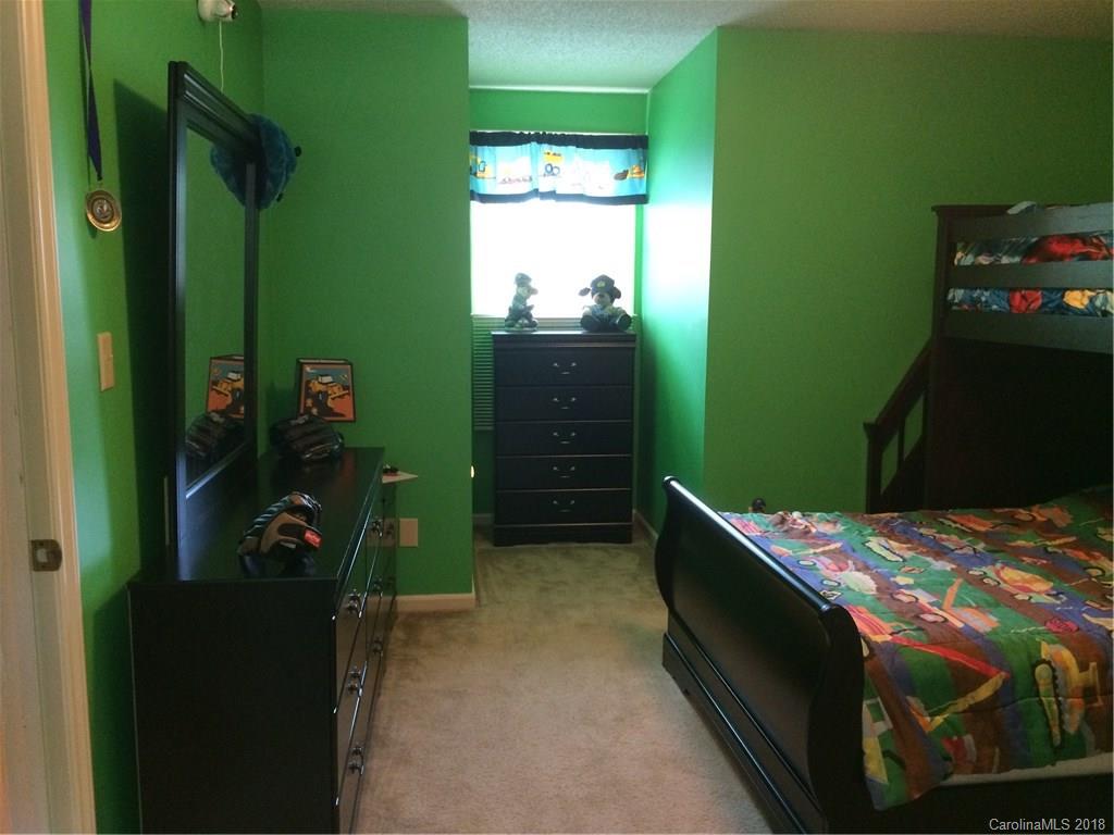5538 Randolph Road Kannapolis, NC 28081 - Photo 11 of 36 a bedroom with a bed and a window