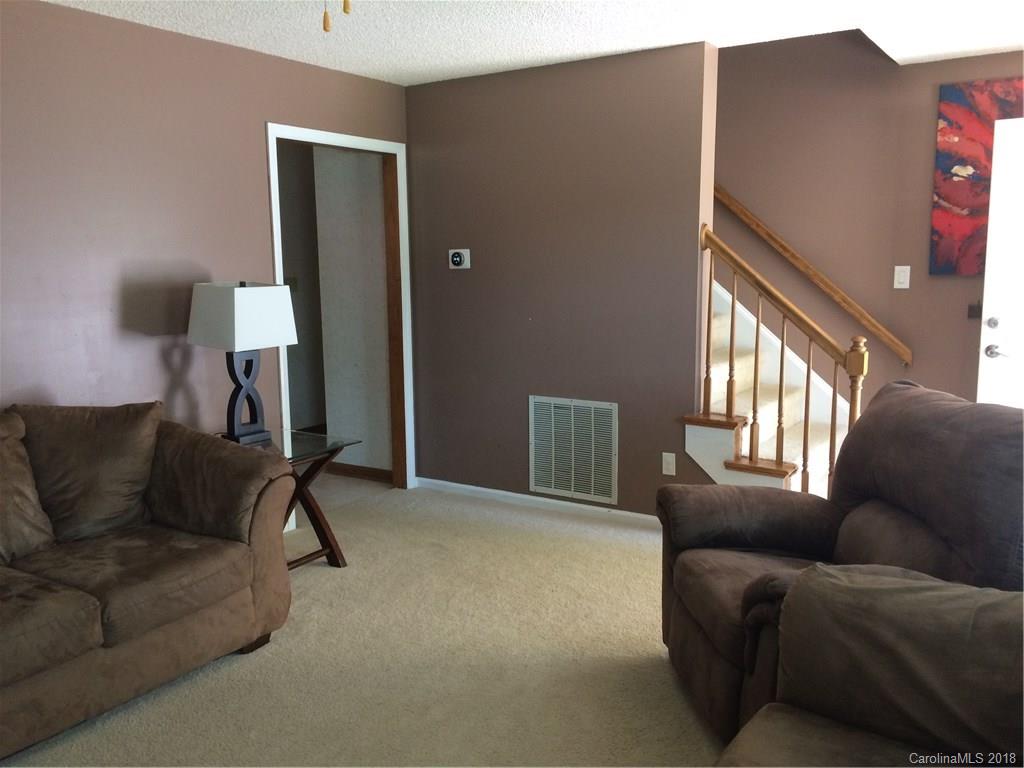 5538 Randolph Road Kannapolis, NC 28081 - Photo 20 of 36 a living room with furniture and a window