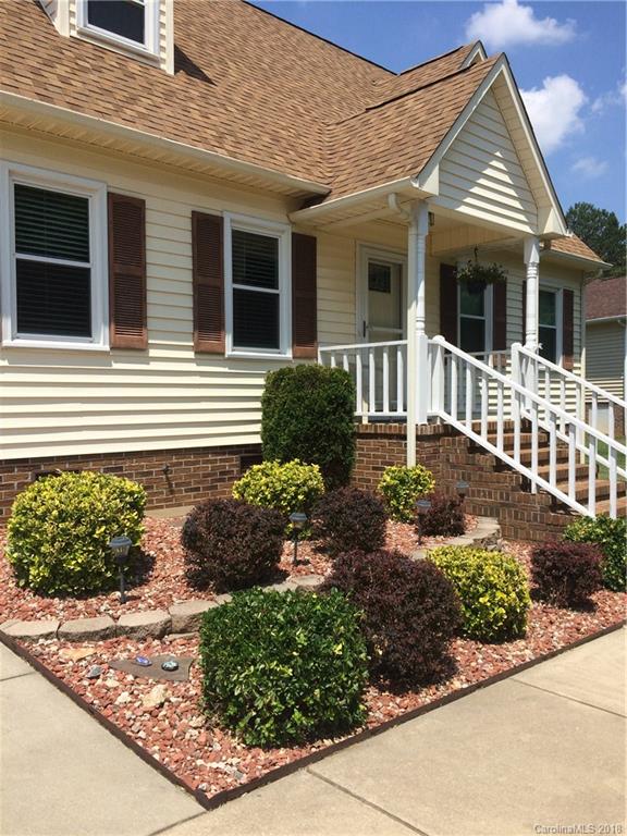 5538 Randolph Road Kannapolis, NC 28081 - Photo 3 of 36 a view of a house with a small yard and plants