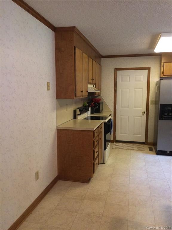5538 Randolph Road Kannapolis, NC 28081 - Photo 22 of 36 a room with a sink and a refrigerator