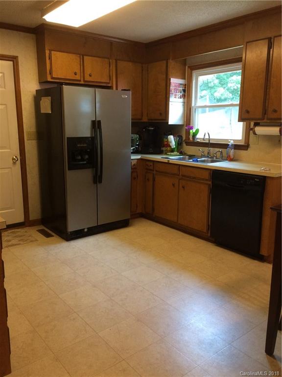 5538 Randolph Road Kannapolis, NC 28081 - Photo 24 of 36 a kitchen with stainless steel appliances a refrigerator and a sink