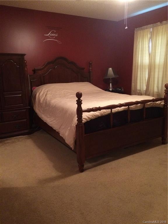 5538 Randolph Road Kannapolis, NC 28081 - Photo 27 of 36 a bedroom with a bed and a window