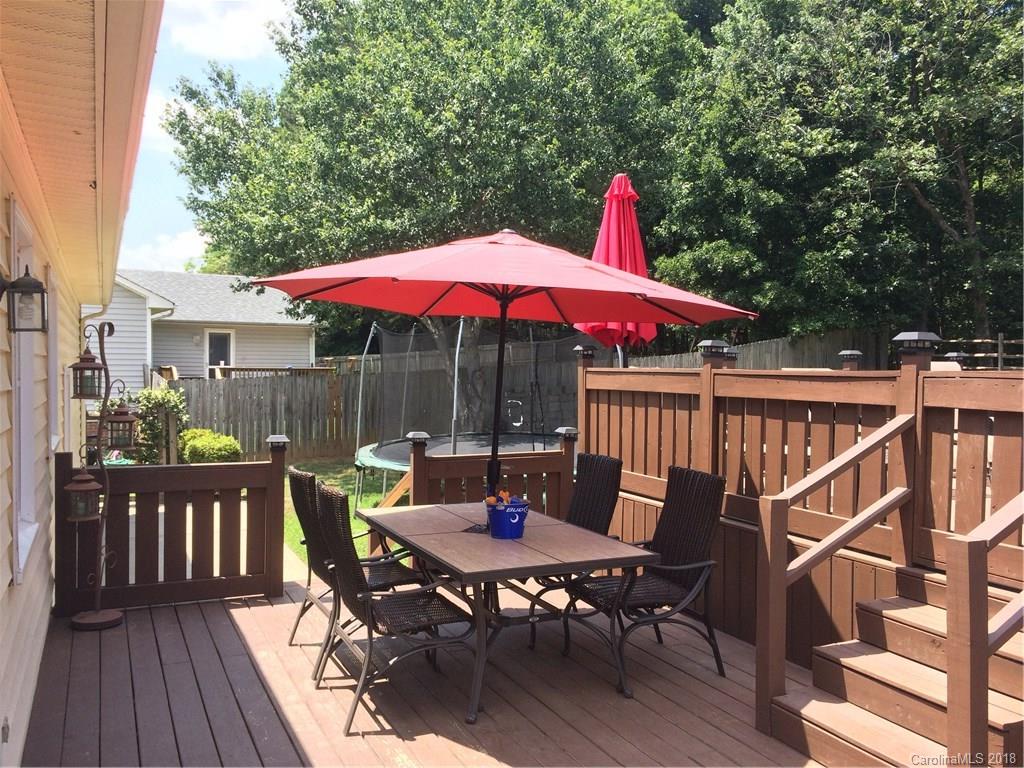 5538 Randolph Road Kannapolis, NC 28081 - Photo 31 of 36 a patio with wooden floor table and chairs