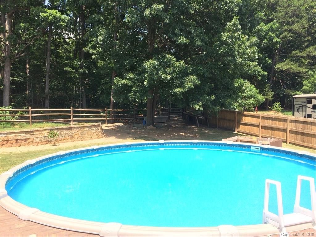 5538 Randolph Road Kannapolis, NC 28081 - Photo 33 of 36 a view of a swimming pool with a yard