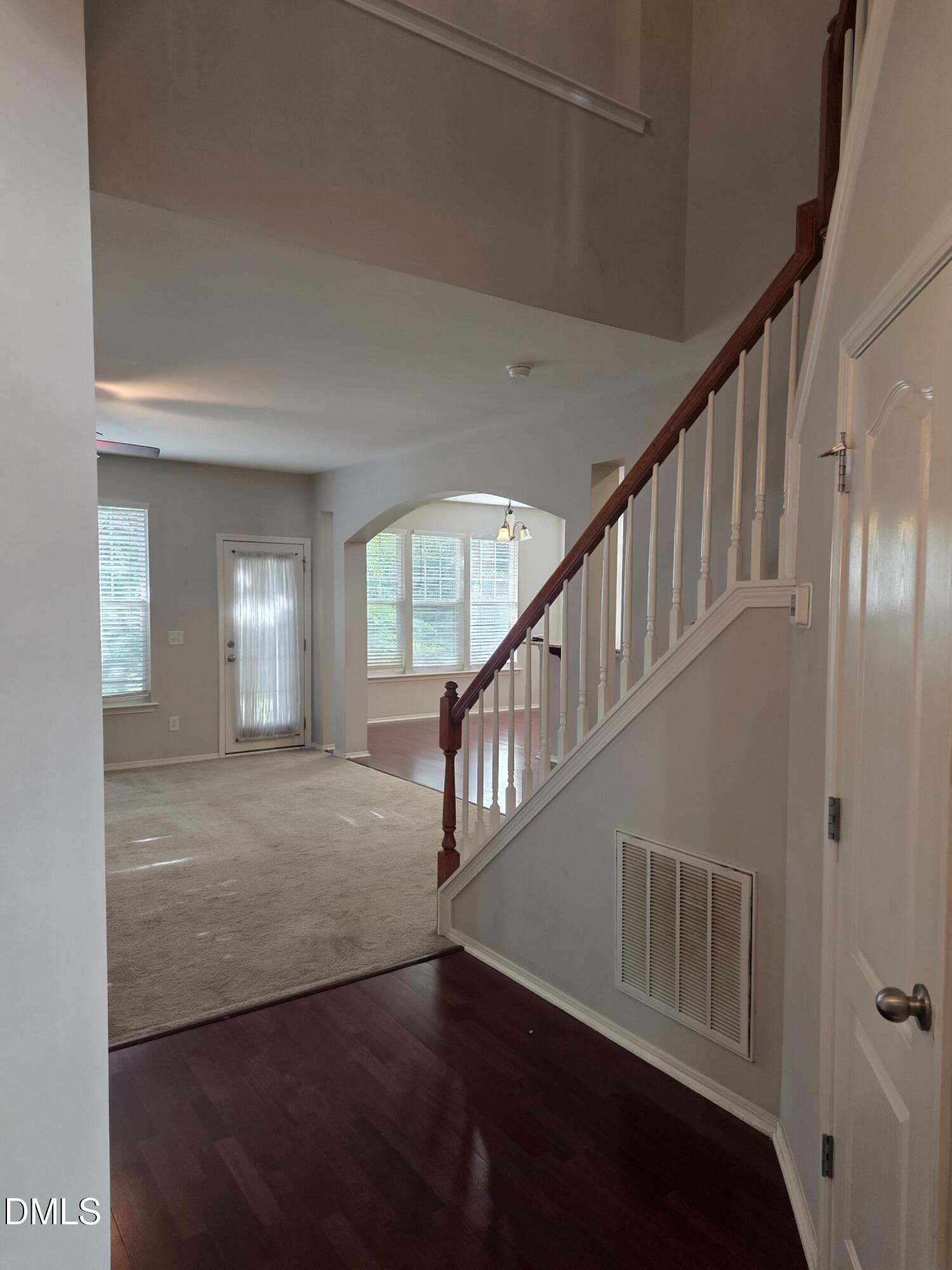 8208 Stone Cellar Drive Raleigh, NC 27613 - Photo 16 of 25 a view of an entryway with wooden floor