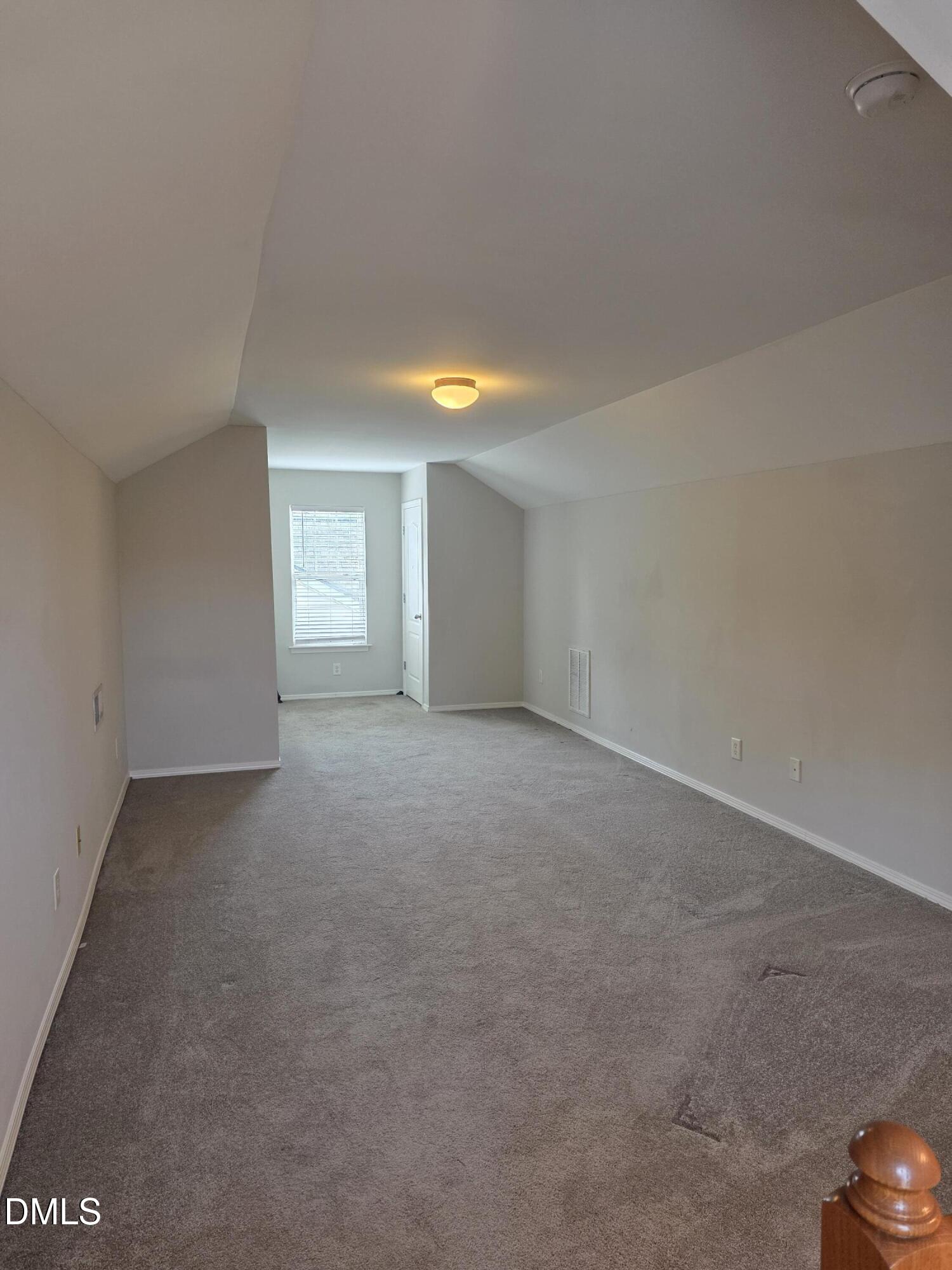 8208 Stone Cellar Drive Raleigh, NC 27613 - Photo 5 of 25 a view of empty room with window