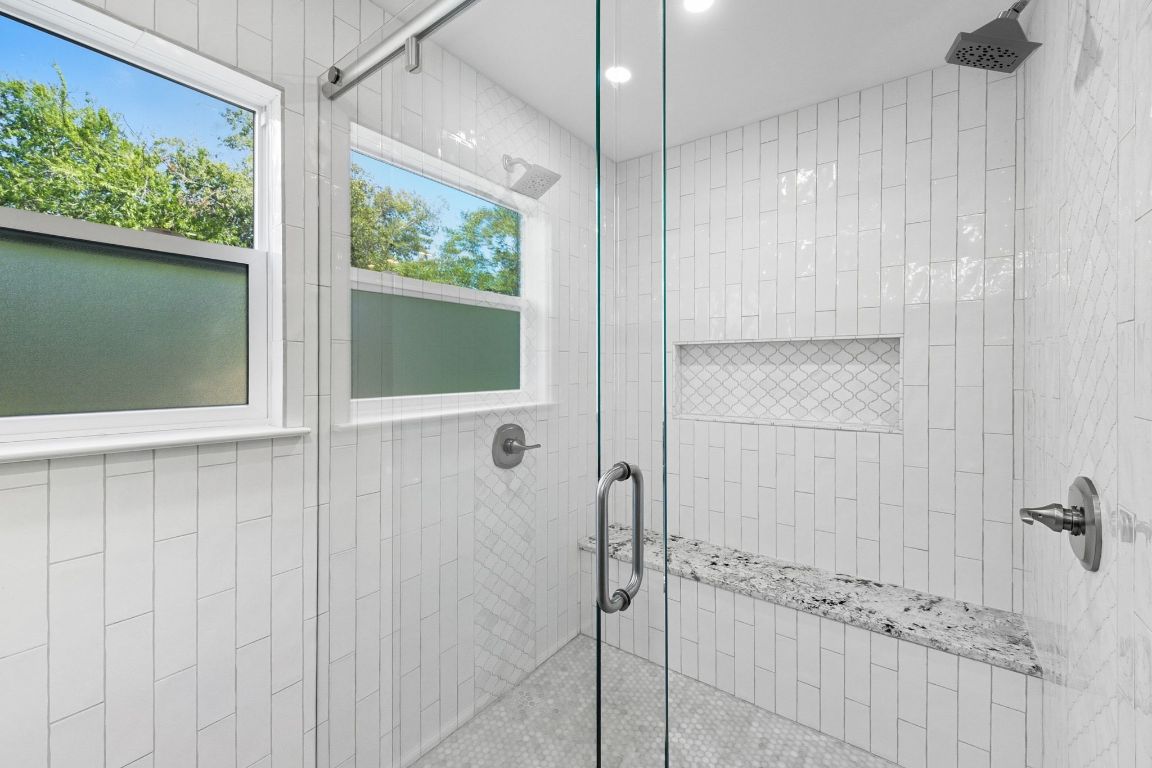 1904 Cedar Ridge Drive Austin, TX 78741 - Photo 34 of 40 a bathroom with a shower