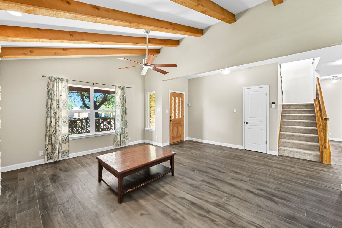 1904 Cedar Ridge Drive Austin, TX 78741 - Photo 5 of 40 a living room with wooden floor furniture and a window