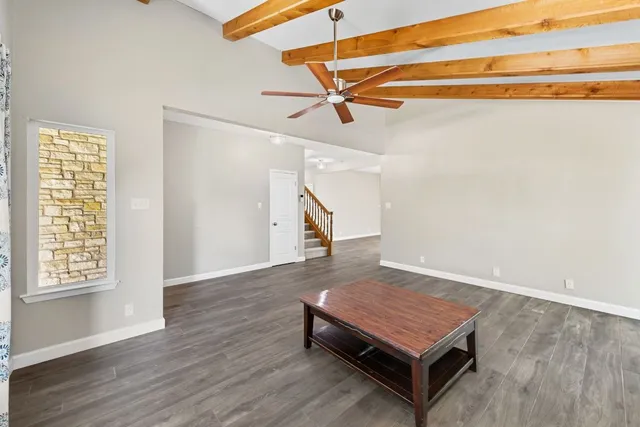 a room with a bed and a window