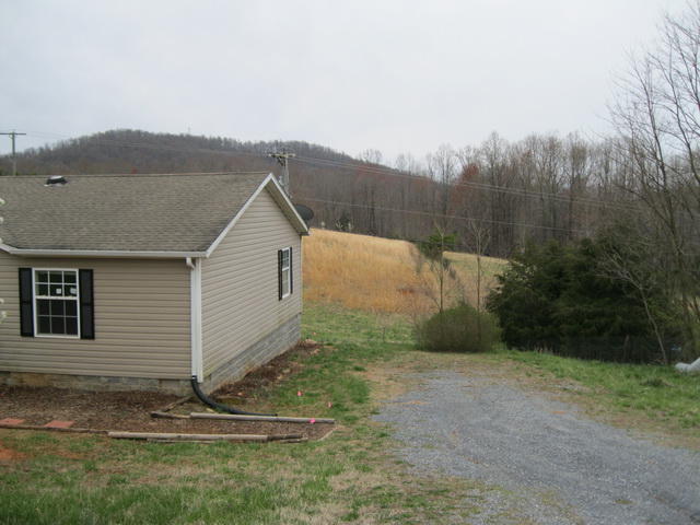 1064 Parrish Road Goodview, VA 24095 - Photo 2 of 21 a view of a backyard