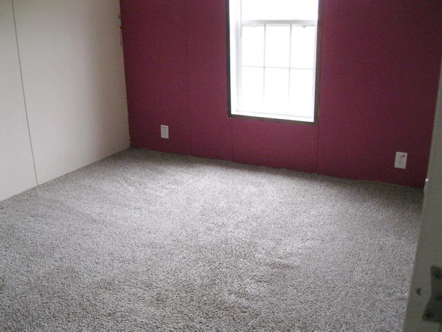 1064 Parrish Road Goodview, VA 24095 - Photo 11 of 21 an empty room with a window