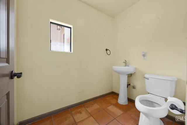 a bathroom with a white bath tub and a shower