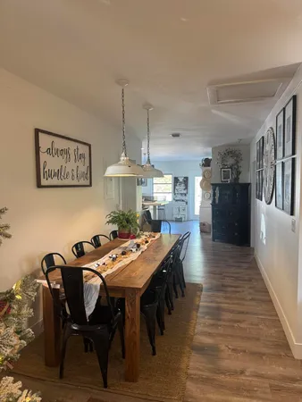 a view of a dining room with furniture