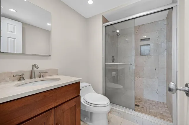 a building outdoor space with swimming pool and furniture