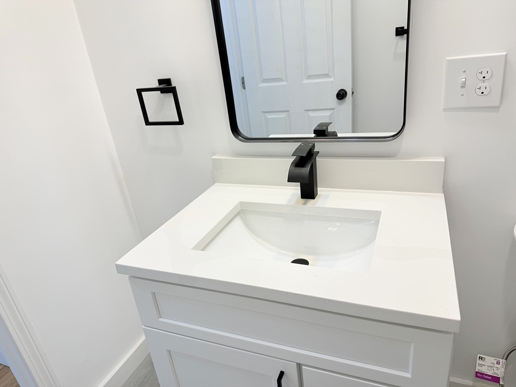 23 Bellevue Street, Unit 2 Worcester, MA 01609 - Photo 10 of 19 a bathroom with a sink