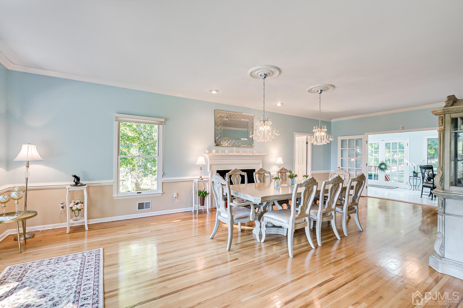 39 Martinsville Road Bernards, NJ 07920 - Photo 11 of 65 a view of a dining room with furniture window and wooden floor