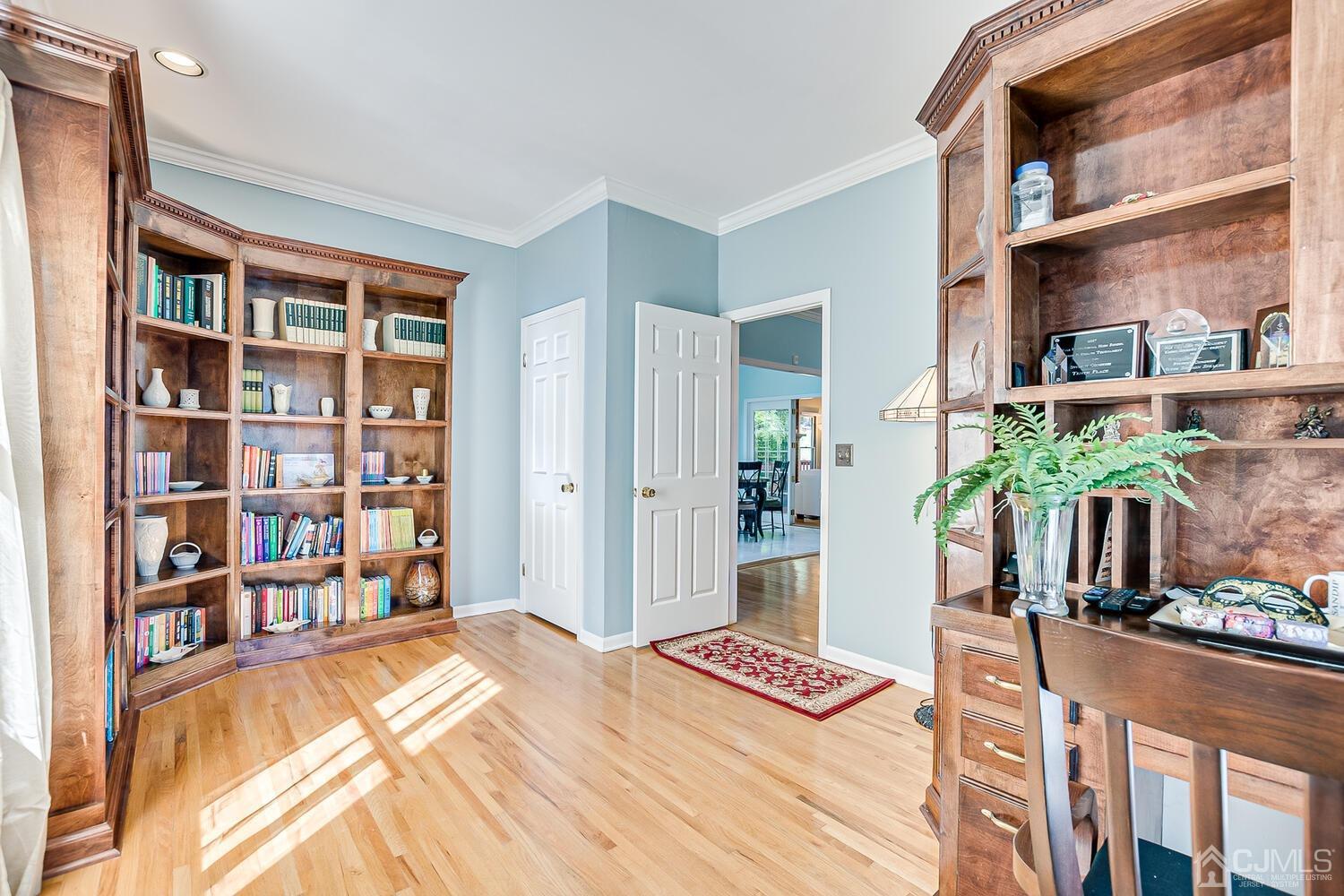 39 Martinsville Road Bernards, NJ 07920 - Photo 14 of 65 a bed room with a bed and a book shelf